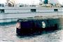 Ubåden Kursk ses her bjærget i en havn tæt ved Murmansk lidt over et år efter ulykken. Billedet er fra 23. oktober 2001. (Arkivfoto)
