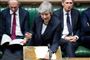 Storbritanniens premierminister, Theresa May, vil gøre klogt i at udsætte briternes farvel til EU, mener mere end 40 tidligere britiske ambassadører. (Arkivfoto).