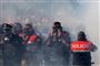 Politi bar gasmasker under lørdagens voldsomme demonstrationer mod regeringen i Albanien.
