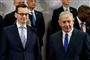 Israels premierminister, Benjamin Netanyahu, har fået kritik af Polen for udtalelser, som faldt under et topmøde om Mellemøsten i Warszawa i denne uge. Billedet her viser Polens premierminister, Mateusz Morawiecki (til venstre), og Benjamin Netanyahu (til højre) side om side under mødet.