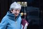 Theresa Mays flertal i det britiske parlament er blevet mindre, efter at tre parlamentsmedlemmer fra Det Konservative Parti onsdag har meddelt, at de trækker sig fra partiet. (Arkivfoto)