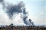 Der steg store mængder sort røg op fra Baghouz søndag, da Syriens Demokratiske Styrker iværksatte angreb mod Islamisk Stat.