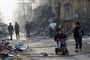 En dreng på en trehjulet cykel i Homs. Den otte år lange krig i Syrien har kostet over 370.000 mennesker livet, deriblandt 112.000 civile. Tallene kommer fra Det Syriske Observatorium for Menneskerettigheder.