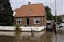 Er dit hus sikret mod de massive mængder af regn, som forventes de kommende årtier? Det kan blive en dyr fornøjelse, hvis der pludselig står vand i kælderen, så sørg for at sikre døre og vinduer - og opbevar ting i plastikkasser og ikke i pap, hvis de skal stå i kælderen. (Arkivfoto)