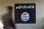 På billedet her ses det flag, der typisk benyttes af Islamisk Stat, malet på en væg. En 14-årig norsk dreng skal være blevet hvervet til gruppen tilbage i 2017.