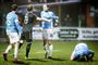 FC Roskilde-spillerne i blåt, her i en pokalkamp mod AaB i 2016, må vente endnu nogle dage med at vide, om deres arbejdsgiver afværger en truende konkurs.