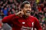 Roberto Firmino bragte Liverpool foran 1-0 på et smukt udført hovedstød, da Tottenham blev slået 2-1.