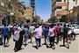 Demonstranter på gaden i Sudans hovedstad, Khartoum, lørdag. De kræver, at præsident Omar al-Bashir træder tilbage.