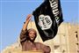 En militant islamist med Islamisk Stats flag i Raqqa i Syrien i 2014. Siden begyndelsen af 2018 har domstole i Irak retsforfulgt og dømt over 500 udlændinge for at have været med i Islamisk Stat (IS). Det oplyser landets højesteret onsdag.