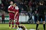 Nicklas Pedersen (til venstre) står her ved siden af Christian Eriksen under en landskamp mod Georgien i 2013. Begge spillere scorede i kampen.