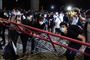 De relativt fredelige demonstrationer søndag førte senere søndag aften til sammenstød mellem demonstranter og politi.
