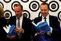 Tidligere brexitminister Dominic Raab og sundhedsminister Matt Hancock er begge blandt de ti kandidater, der ønsker at indtage posten som partileder og dermed også premierminister efter Theresa May. Her ses de ved en bogreception mandag.