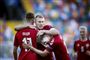 Danmarks Rasmus Nissen Kristensen sammen med Andreas Skov Olsen og Joakim Mæhle ved 3-1 målet mod Østrig.