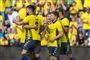 Brøndby-spillere jubler efter en scoring mod Silkeborg.