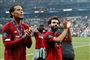 Virgil van Dijk (tv.) var en vigtig brik på det Liverpool-mandskab, som strøg til tops i Champions League.