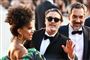 Fimen "Joker" med den amerikanske skuespiller Joaquin Phoenix (midt.), skuespiller Zazie Beetz (tv.) og Todd Phillips (th.) som instruktør, havde premiere ved filmfestivalen i Venedig 31. august. (Arkivfoto.)