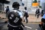 Kampklædt politi i Hongkongs gader. I over tre måneder har hundredtusinder af mennesker demonstreret for mere demokrati i Hongkong og krævet, at Kina ikke gør forsøg på at dominere bystaten. (Arkiv)