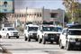 En konvoj af ambulancer evakuerer sårede civile og medlemmer af den kurdiskledede styrke Syriske Demokratiske Styrker (SDF) fra Ras al-Ain søndag.