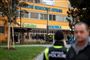Police officers stand guard near the site of a shooting in front of a hospital in Ostrava, Czech Republic, December 10, 2019. REUTERS/Lukas Kabon