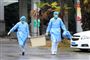 I Wuhan, hvor udbrud af virus begyndte, er en række aktiviteter aflyst i et forsøg på at forhindre yderligere spredning af virusset. Foto viser personale fra det hospital i Wuhan, hvor alle smittede bliver behandlet.