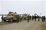 Afghanske militærstyrker er her på vej mod stedet, hvor et fly mandag blev meldt styrtet ned i den østlige Ghazni-provins.