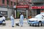 Udbruddet af et nyt coronavirus menes at stamme fra millionbyen Wuhan i Hubei-provinsen. For at forhindre smittespredning er stort set al trafik ud og ind af byen indstillet, og taxachauffører er iført beskyttelsesdragter. (Arkivfoto).