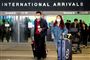 På verdensplan er knap 77.000 mennesker smittet med coronavirus. På billedet her er det passagerer fra Shanghai, der forlader Los Angeles International Airport (LAX). (Arkivfoto)