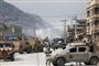 Afghanske soldater ved det sted i Kabul, der onsdag er blevet ramt af et selvmordsangreb.