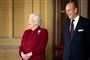 Prins Philip (til højre) ses her tilbage i 2014 side om side med sin hustru, dronning Elizabeth.