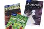 Rejsebøger fra Lonely Planet, her fra Thailand, Australien og Cambodia, er populære verden over. Forlaget havde inden coronakrisen en markedsandel for rejsebøger på 31,5 procent.