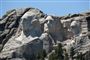 USA's præsident planlægger at skyde fejringen af 4. juli i gang ved monumentet Mount Rushmore, der afbilleder de fire præsidenter George Washington, Thomas Jefferson, Theodore Roosevelt og Abraham Lincoln.