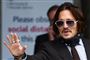 Johnny Depp mistede angiveligt en del af sin finger, da Amber Heard kastede en flaske efter ham under et skænderi. Her ses han ankomme til retten.