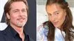 Brad Pitt med en smuk ung mørkhåret model
