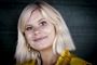 Portrætbillede af en smilende Sofie Linde