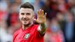 Billede af en bredt smilende David Beckham