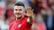 Billede af en bredt smilende David Beckham