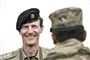 Prins Joachim med militærhue og militærskjorte han smiler