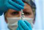 Sygeplejerske forbereder en vaccination
