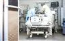 sundhedspersonale ved seng på hospitel