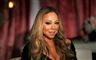 nærbillede af sangeren Mariah Carey hun har dramatisk makeup på og håret er krøllet på Hollywood-maner i spidserne