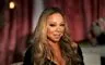 nærbillede af sangeren Mariah Carey hun har dramatisk makeup på og håret er krøllet på Hollywood-maner i spidserne
