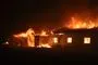 Voldsomme flammer i bygning