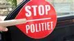 Billede af skilt med "stop - politiet"