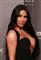 Billede af Kim Kardashian i en nedringet sort kjole