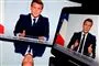 Præsident Macron holder tale til folket ved et skrivebord med det franske flag i baggrunden
