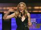 Sangerinden LeAnn Rimes smiler og vinker