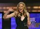 Sangerinden LeAnn Rimes smiler og vinker