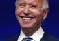 Nærbillede af Joe Biden hvor han smiler stort