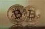 To Bitcoin-mønter.