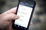 Mobiltelefon med kørekort-app